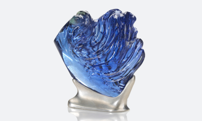 The 725 ct, L’Heure Bleu is the world’s largest fine color natural unheated Tanzanite carving.